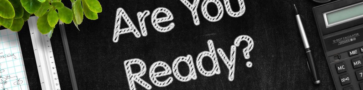 Are You Ready. Business Concept Handwritten on Black Chalkboard. Top View Composition with Chalkboard and Office Supplies. 3d Rendering.