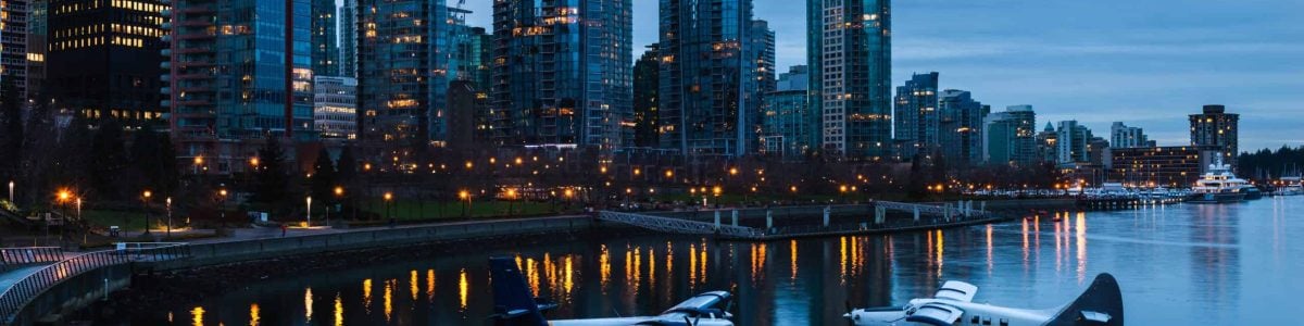 The sun sets over Coal Harbour in Vancouver, Canada.