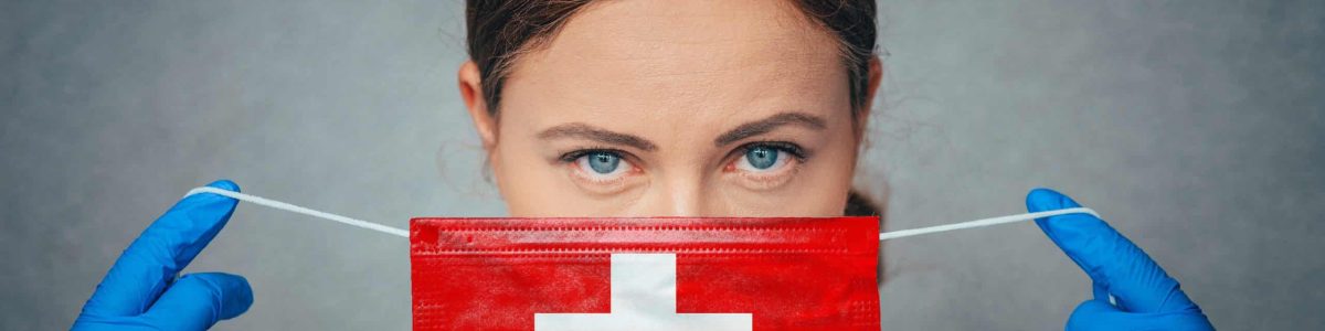 Coronavirus in Switzerland Female Doctor Portrait hold protect Face surgical medical mask with Switzerland National Flag. Illness, Virus Covid-19 in Switzerland, concept photo