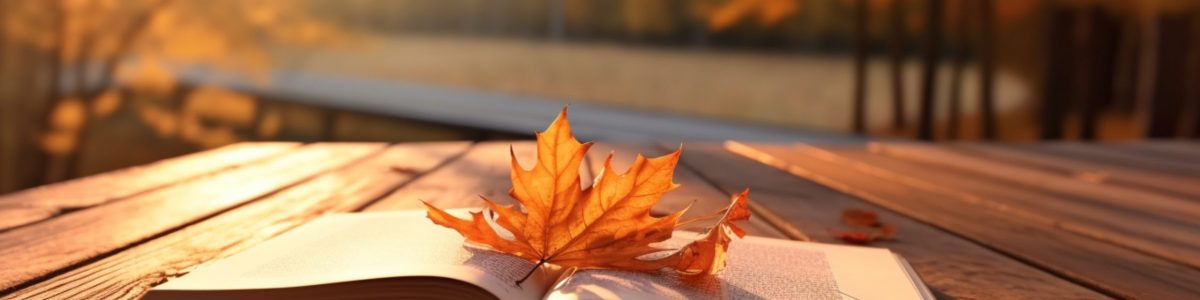 Educational retreat, Open book on wooden bench, embracing autumn scenery Generative AI