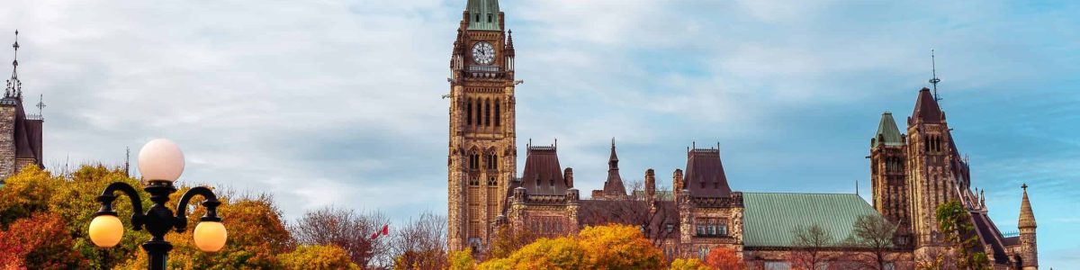 Wide Shot of Fall Foliage in Front of Canadian Parliament Building