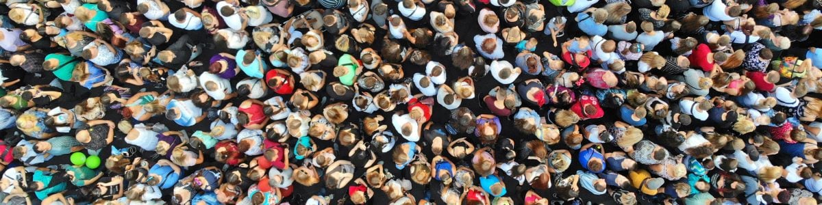 Aerial. People crowd background. Mass gathering of many people in one place. Top view.