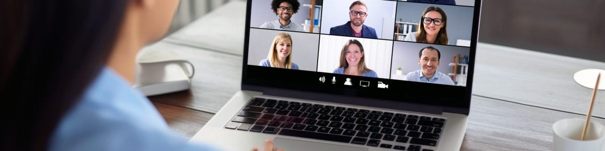 businesswoman having video conference call with colleagues. remote workers discussing work plans by video digital conference call on laptop.