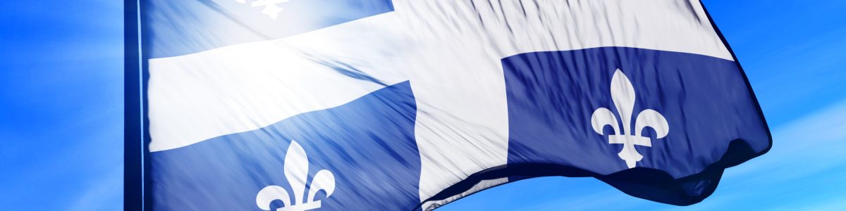 Quebec (Canada) flag waving on the wind