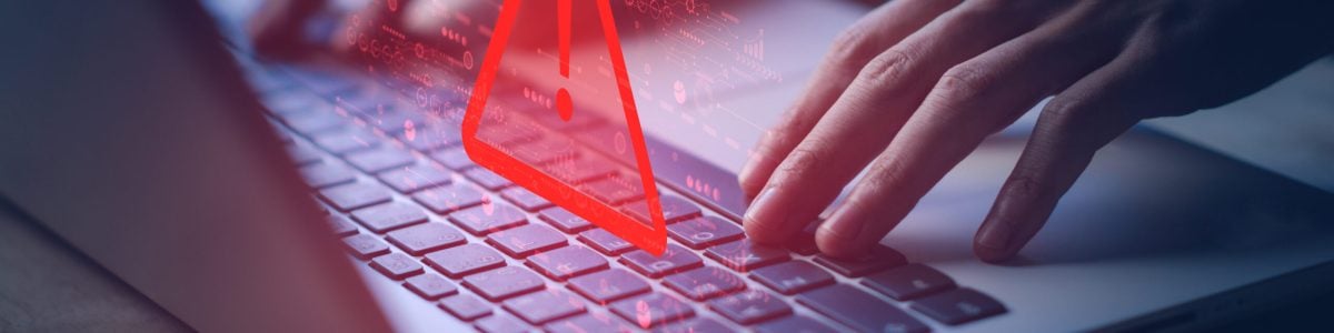 System hacked warning alert on notebook (Laptop). Cyber attack on computer network, Virus, Spyware, Malware or Malicious software. Cyber security and cybercrime. Compromised information internet.